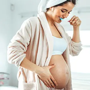 WHY DOES PREGNANCY AFFECT OUR TEETH?